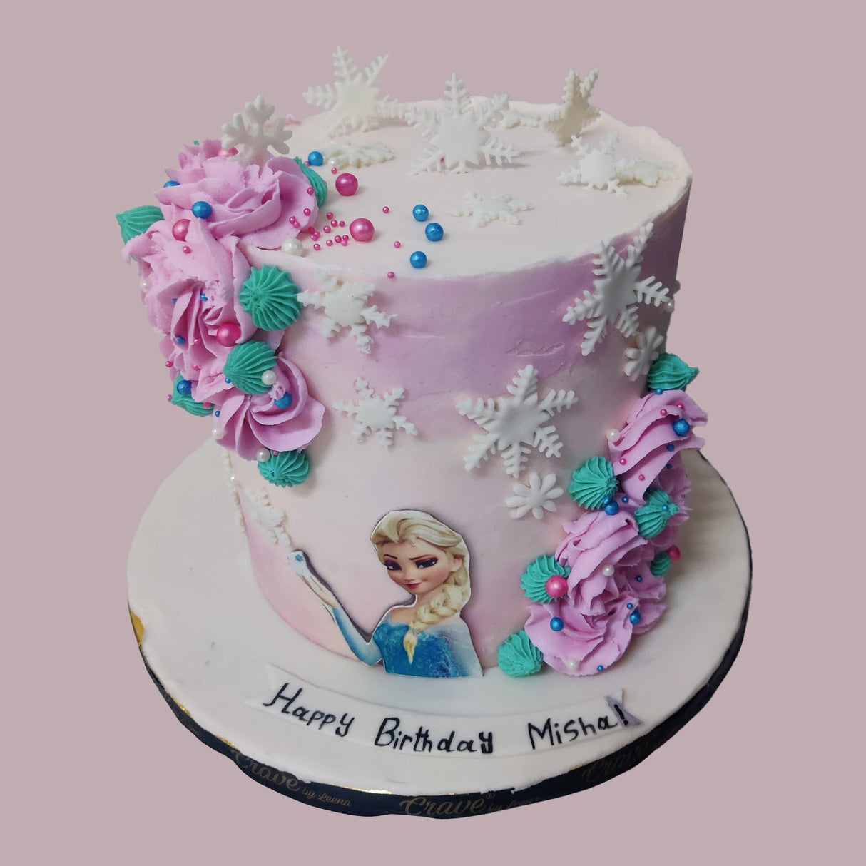 Pink Frozen theme cake